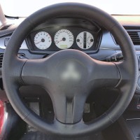 Оплетка на руль из натуральной кожи Mitsubishi Lancer IX Рестайлинг 2005-2010 г.в. (для руля без штатной кожи, черная)